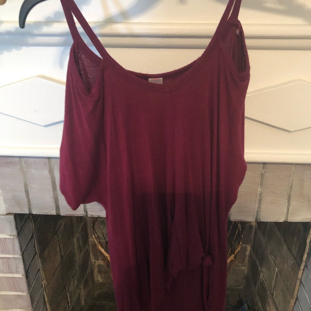 Ladies size small burgundy colored peekaboo top
